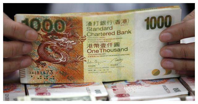 香港明明是中国的领土，为何用的却是港币？不能强制用人民币吗？